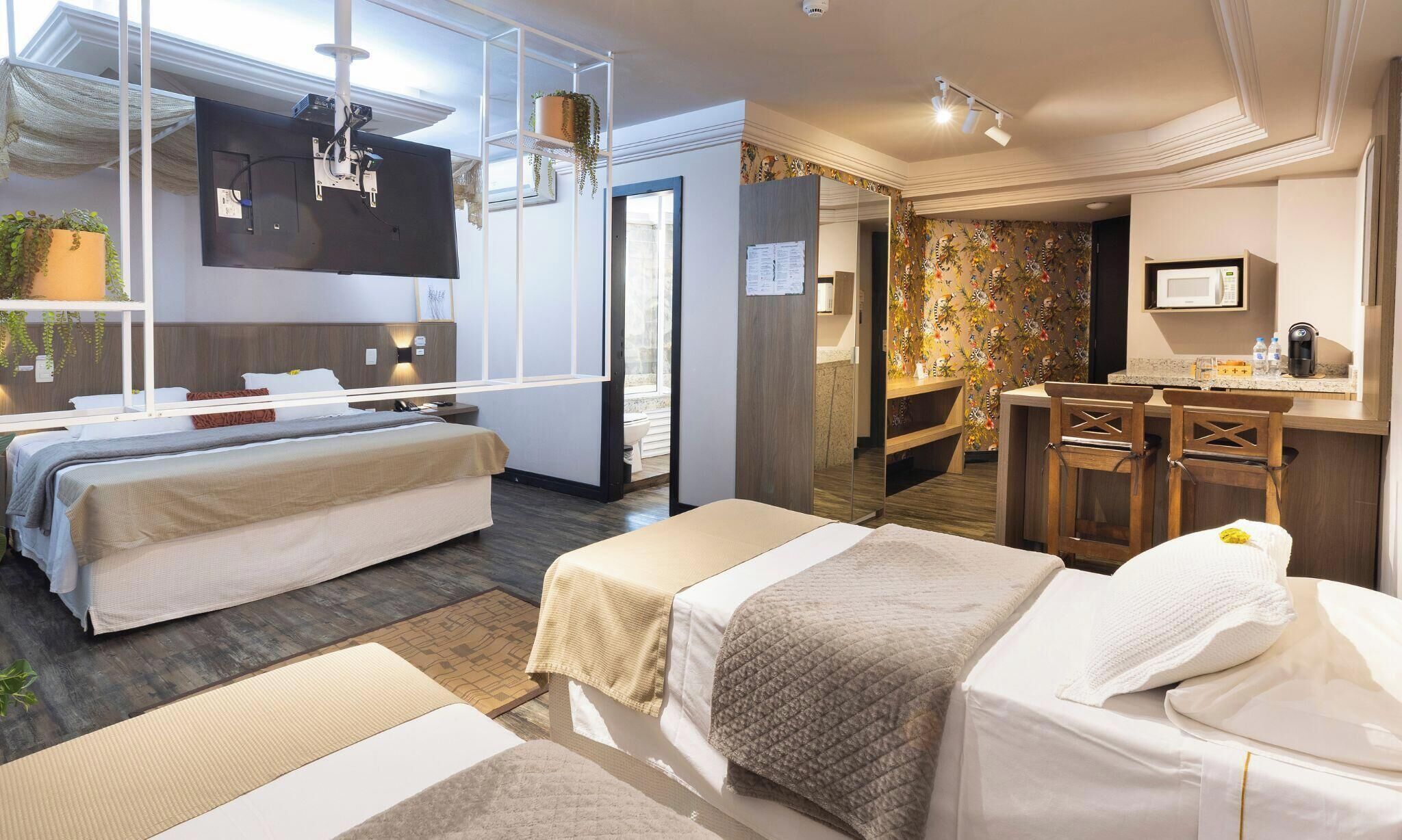 Master Suite | Minibar, in-room safe, individually furnished, desk