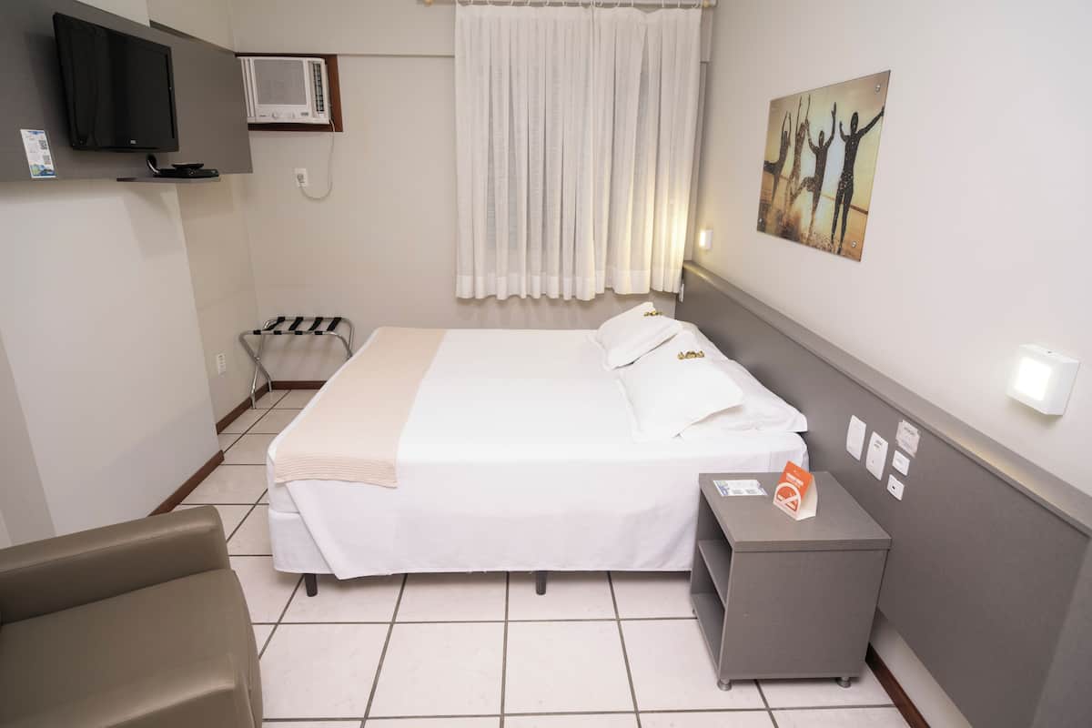 Standaard eenpersoonskamer | 1 slaapkamer, een minibar, een kluis op de kamer
