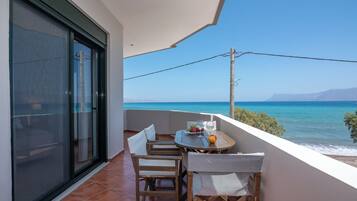 Junior suite, sea front | Terrace/patio