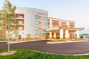 Experience the convenience of a covered outdoor area and a well-maintained lawn at this hotel.