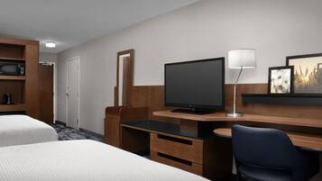 Pillow-top beds, desk, blackout curtains, iron/ironing board