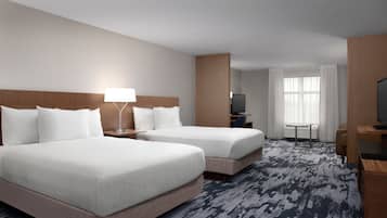 Pillowtop beds, desk, blackout drapes, iron/ironing board