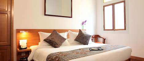 Colchones con pillow-top, minibar y caja de seguridad en la habitación