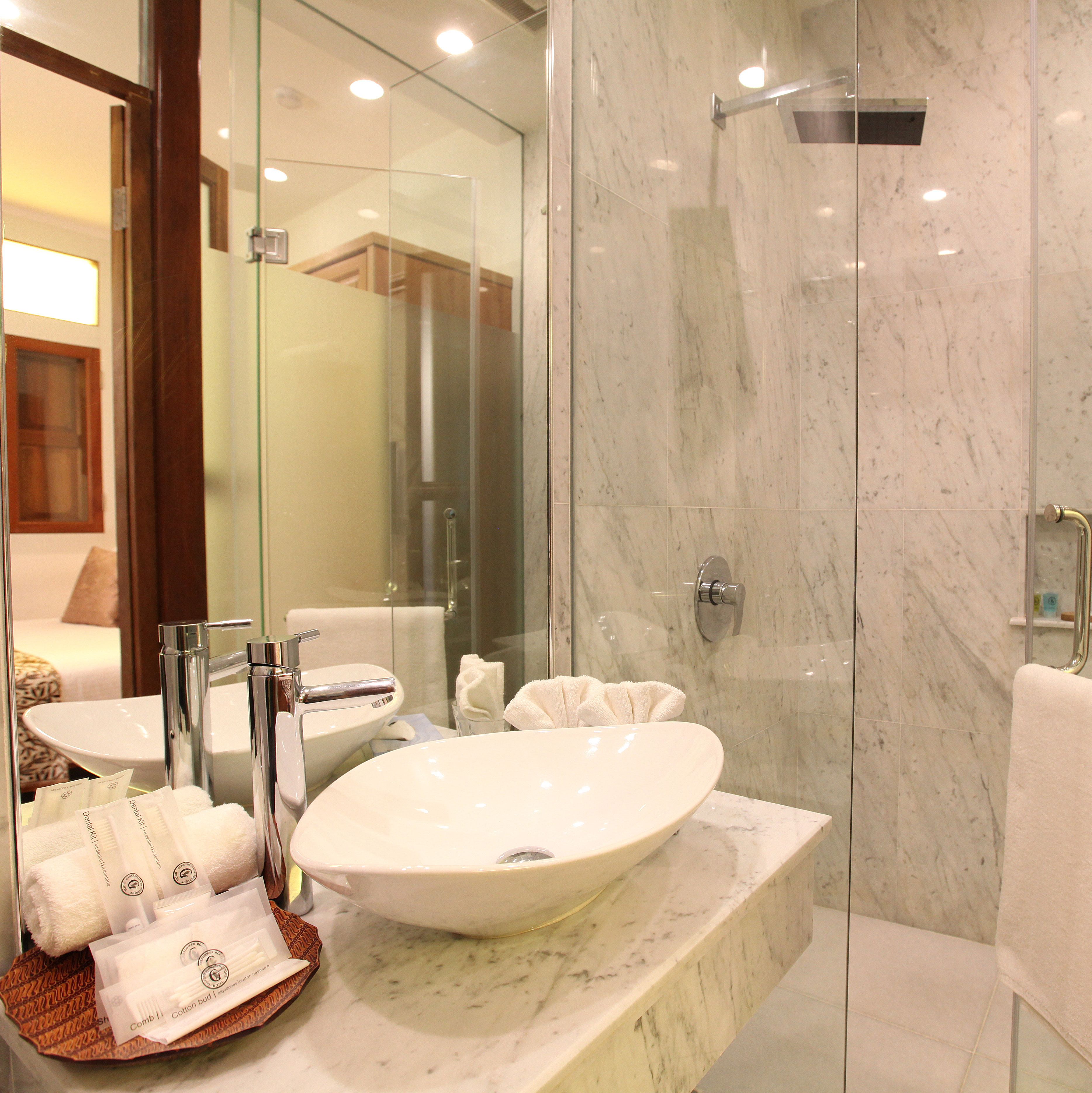 shower, rainfall showerhead, designer toiletries, hair dryer