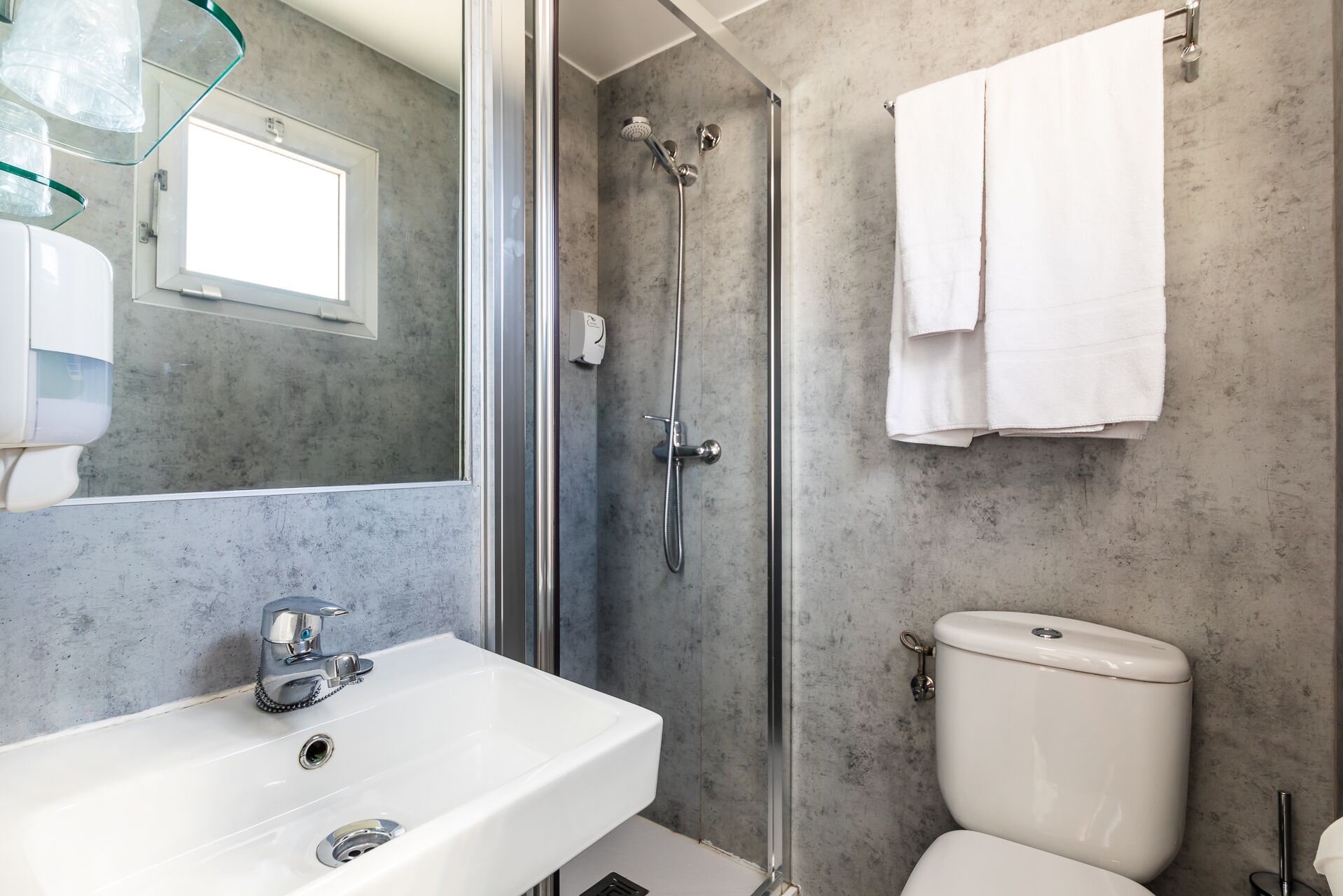 hair dryer, bidet, towels