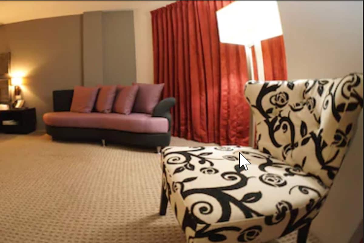 superior room | living area | flat-screen tv