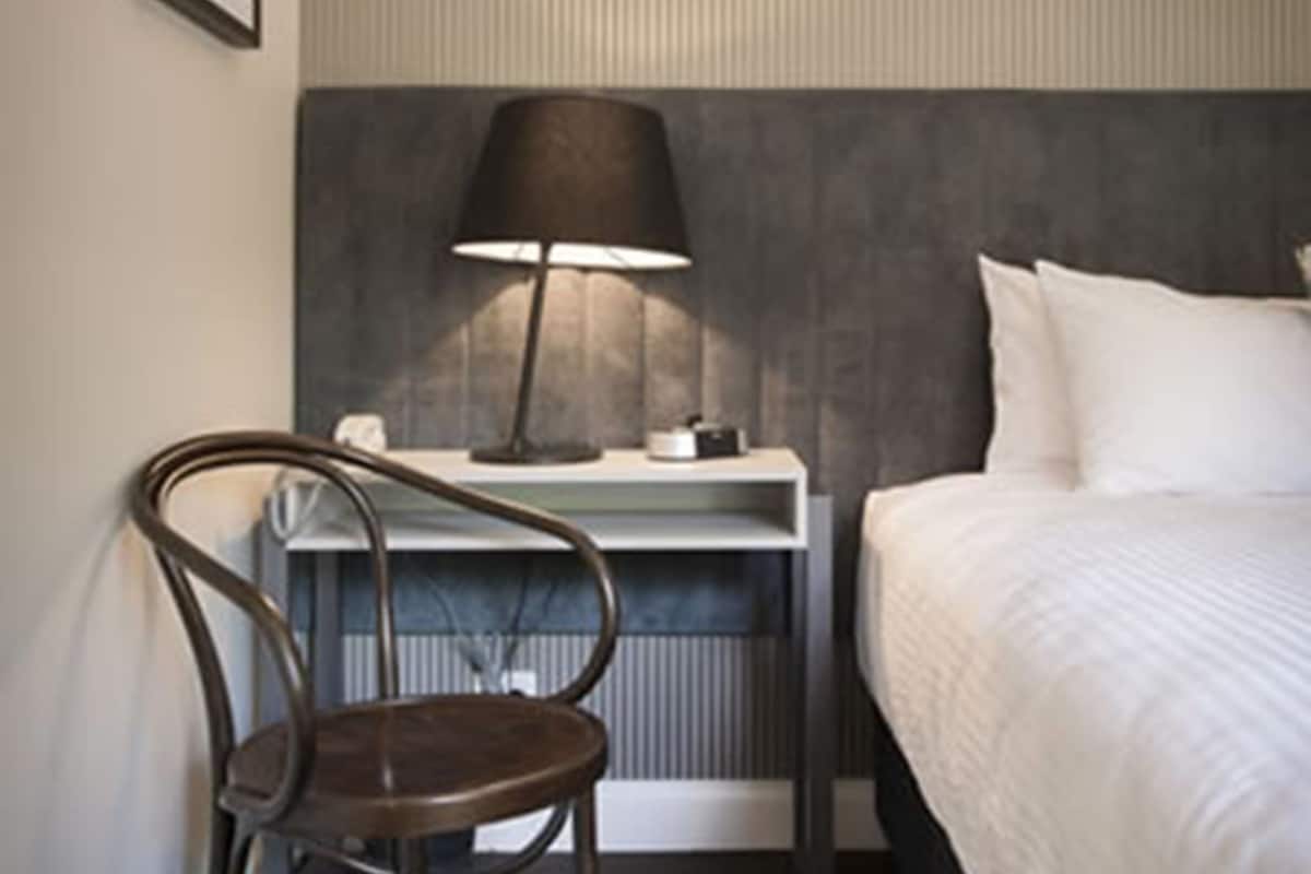 Premium bedding, desk, blackout drapes, iron/ironing board