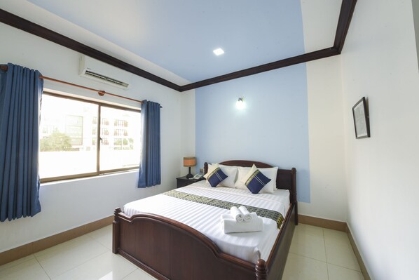 Deluxe Double Room | Pillowtop beds, in-room safe, individually decorated, desk