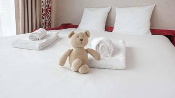 Family Suite, Multiple Beds | Free minibar, in-room safe, desk, blackout drapes