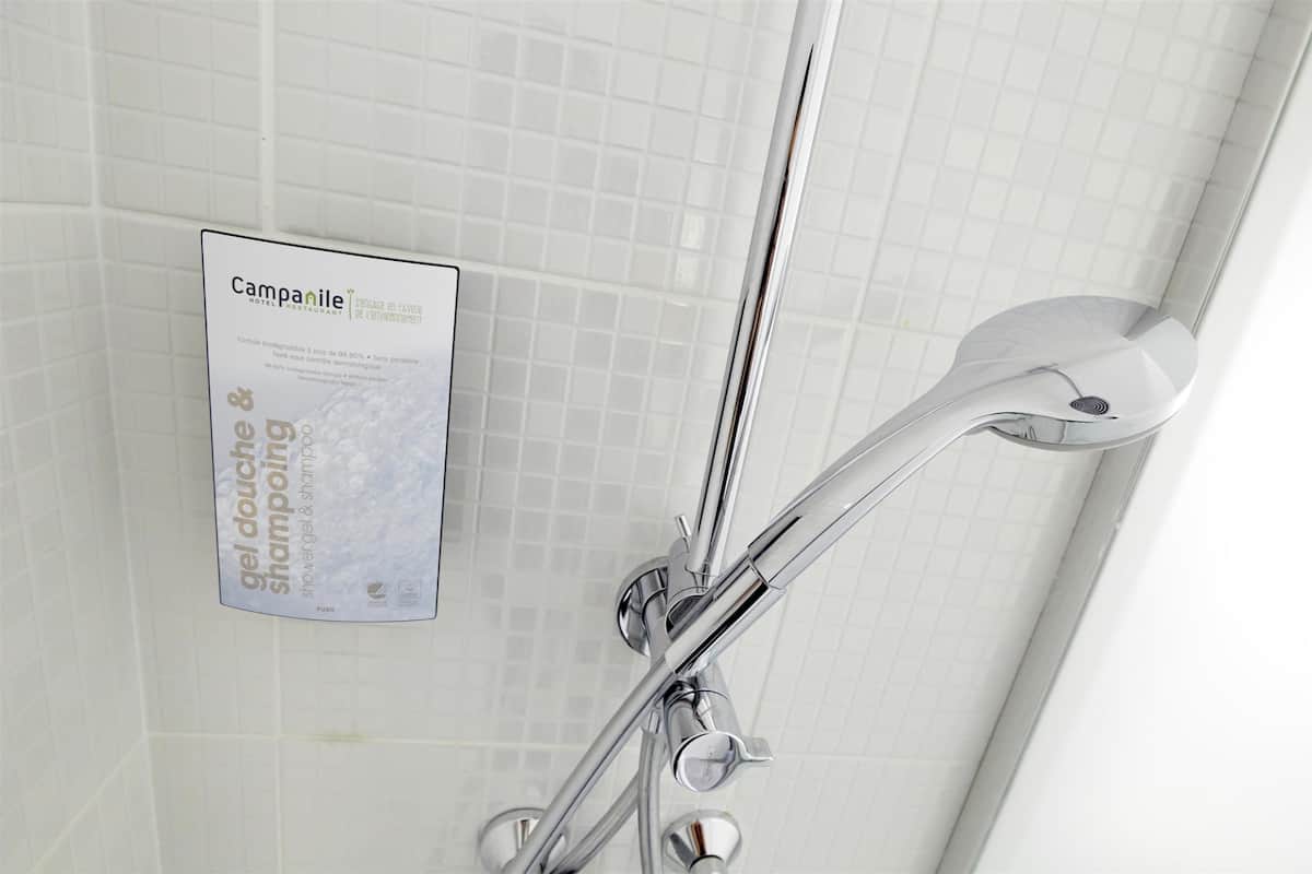 eco-friendly toiletries, hair dryer, towels