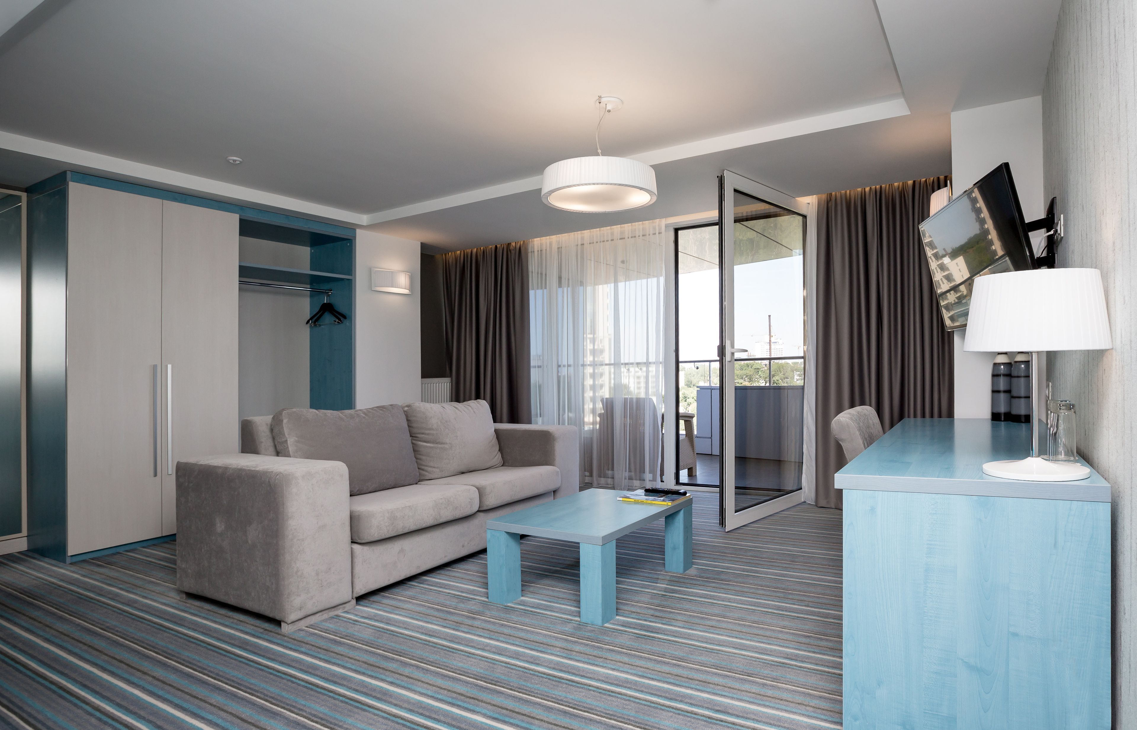 Junior Suite, Terrace | Living area | 42-inch LCD TV with cable channels, TV