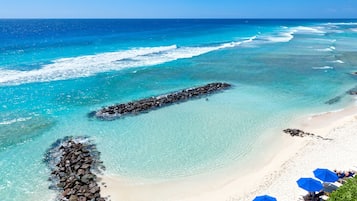 On the beach, sun-loungers, beach towels