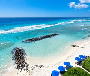 On the beach, sun-loungers, beach towels