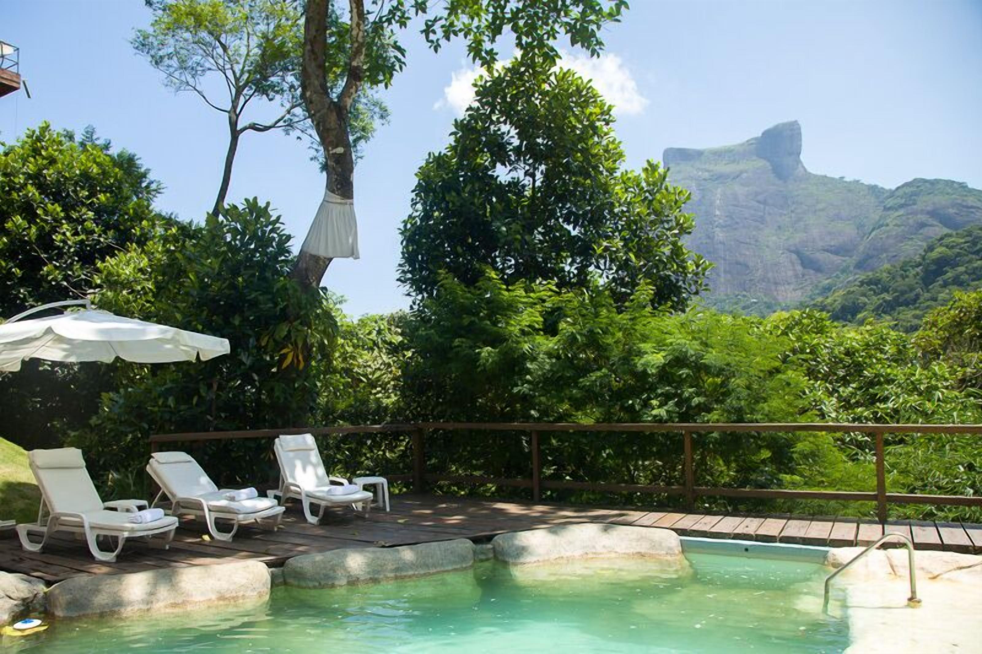 2 outdoor pools, pool umbrellas, pool loungers