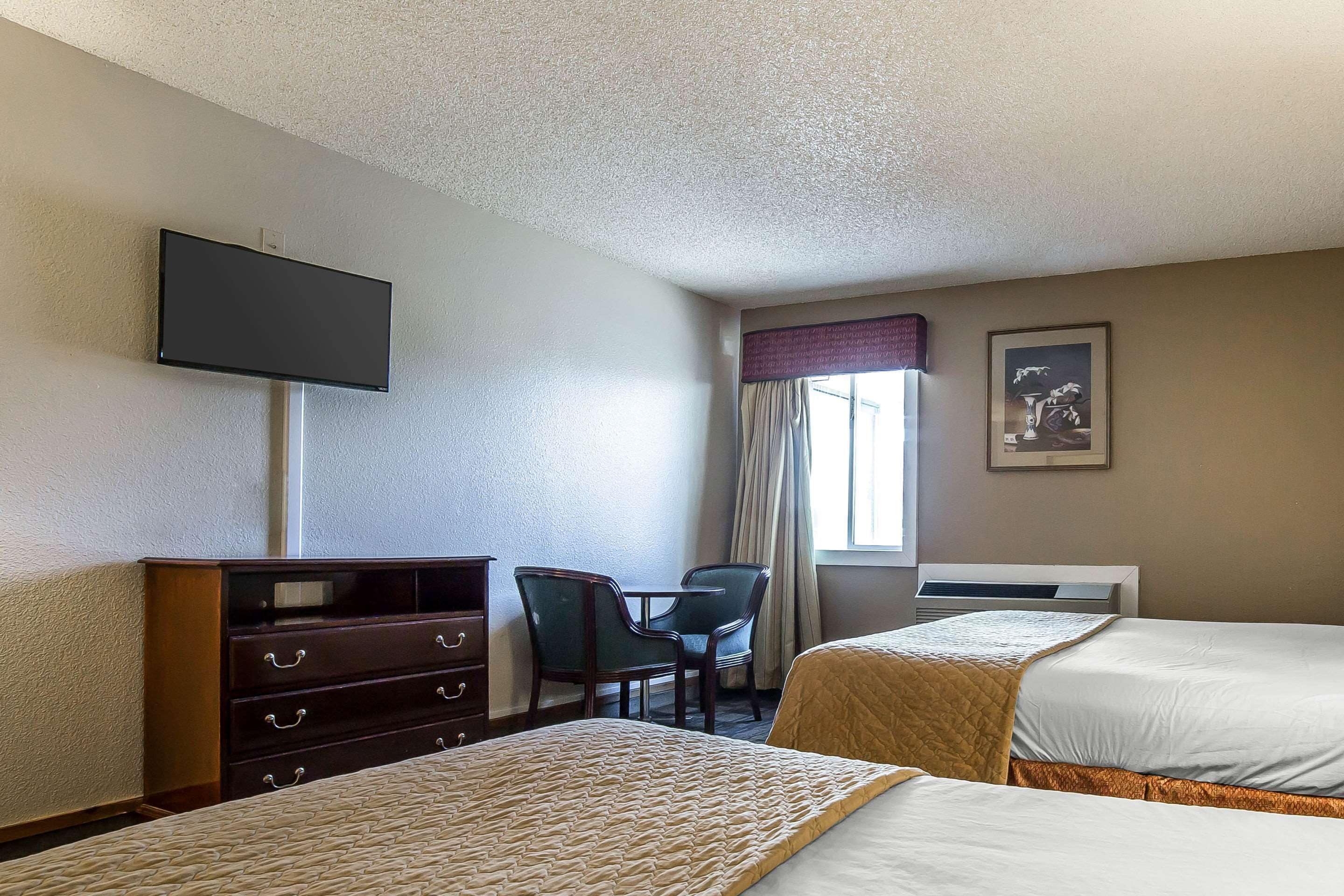 Premium bedding, desk, blackout curtains, iron/ironing board