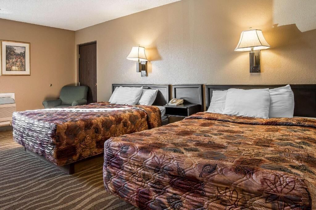 Premium bedding, desk, blackout drapes, iron/ironing board