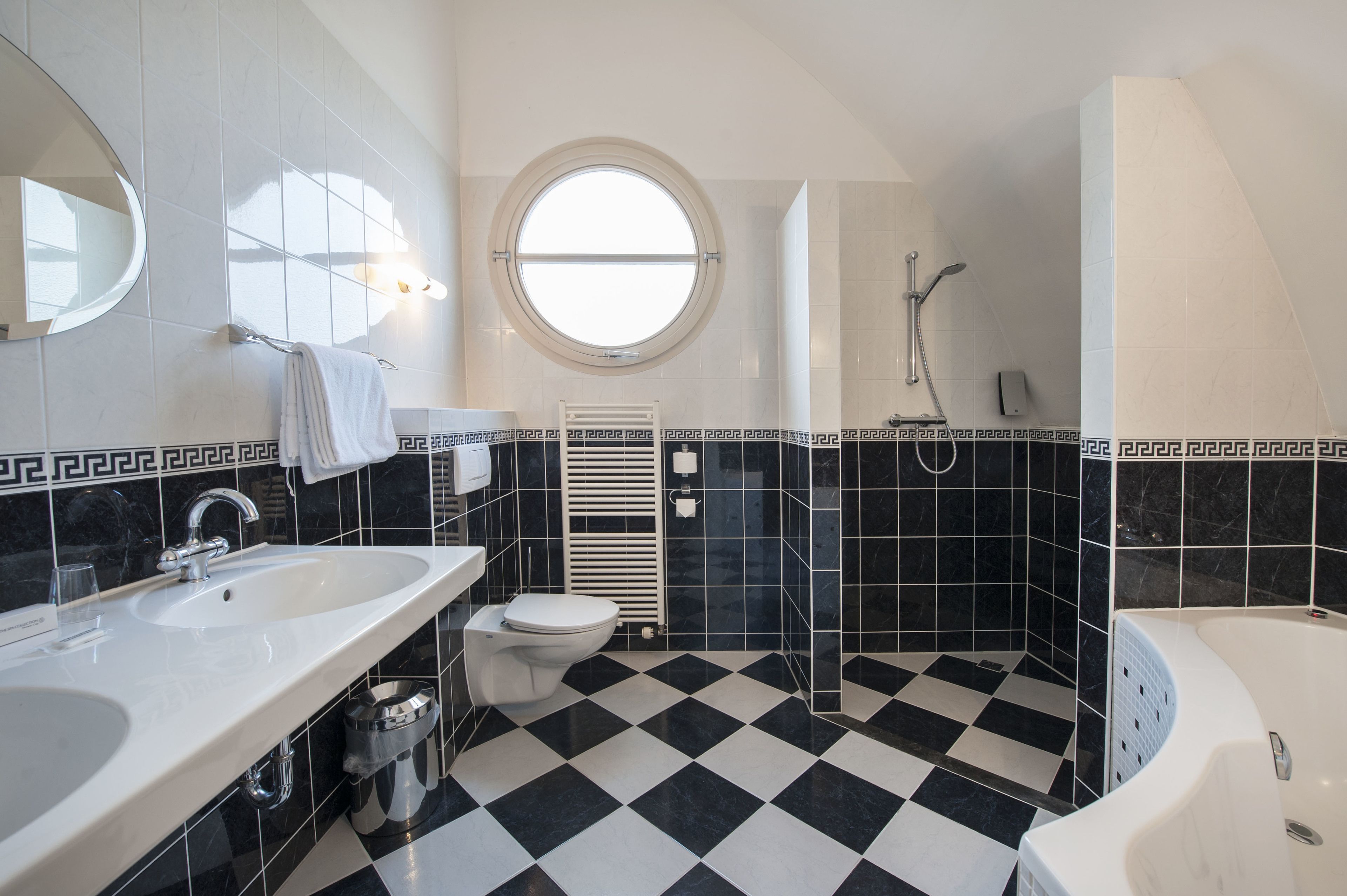 junior suite | bathroom | hair dryer, towels