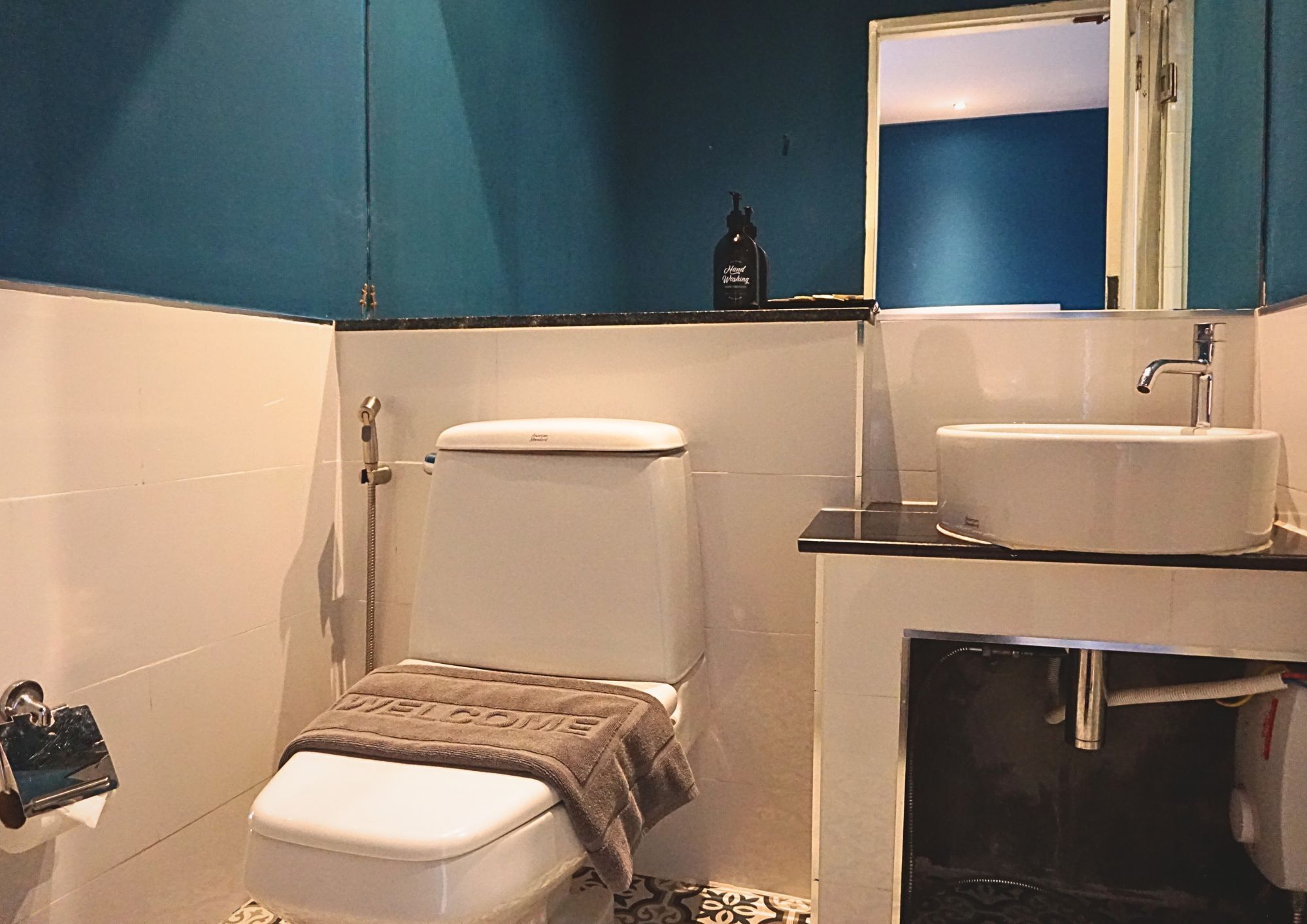 deluxe king pool view | bathroom | shower, free toiletries, hair dryer, towels