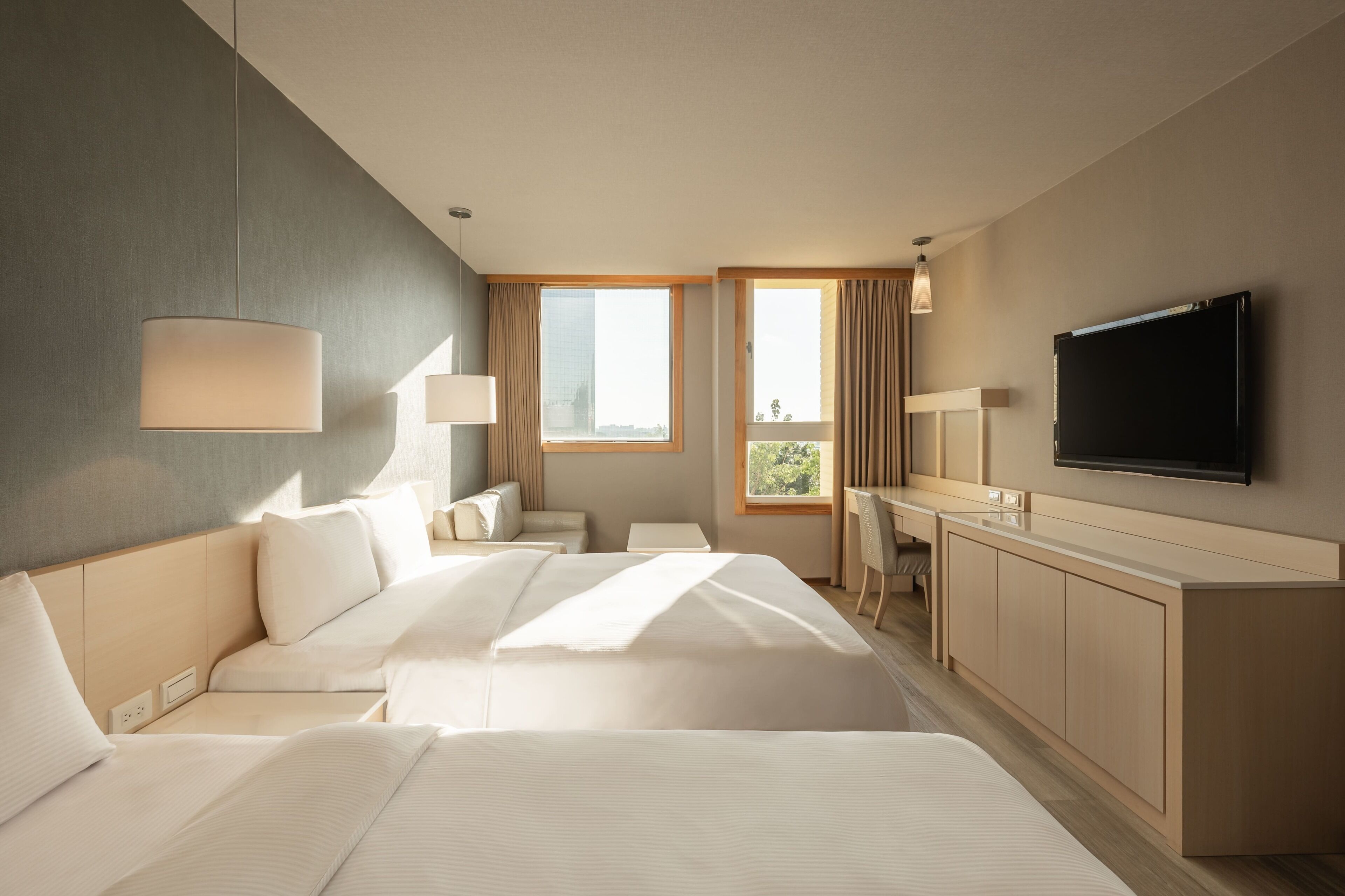 deluxe quadruple room | premium bedding, down duvets, pillow-top beds, individually decorated