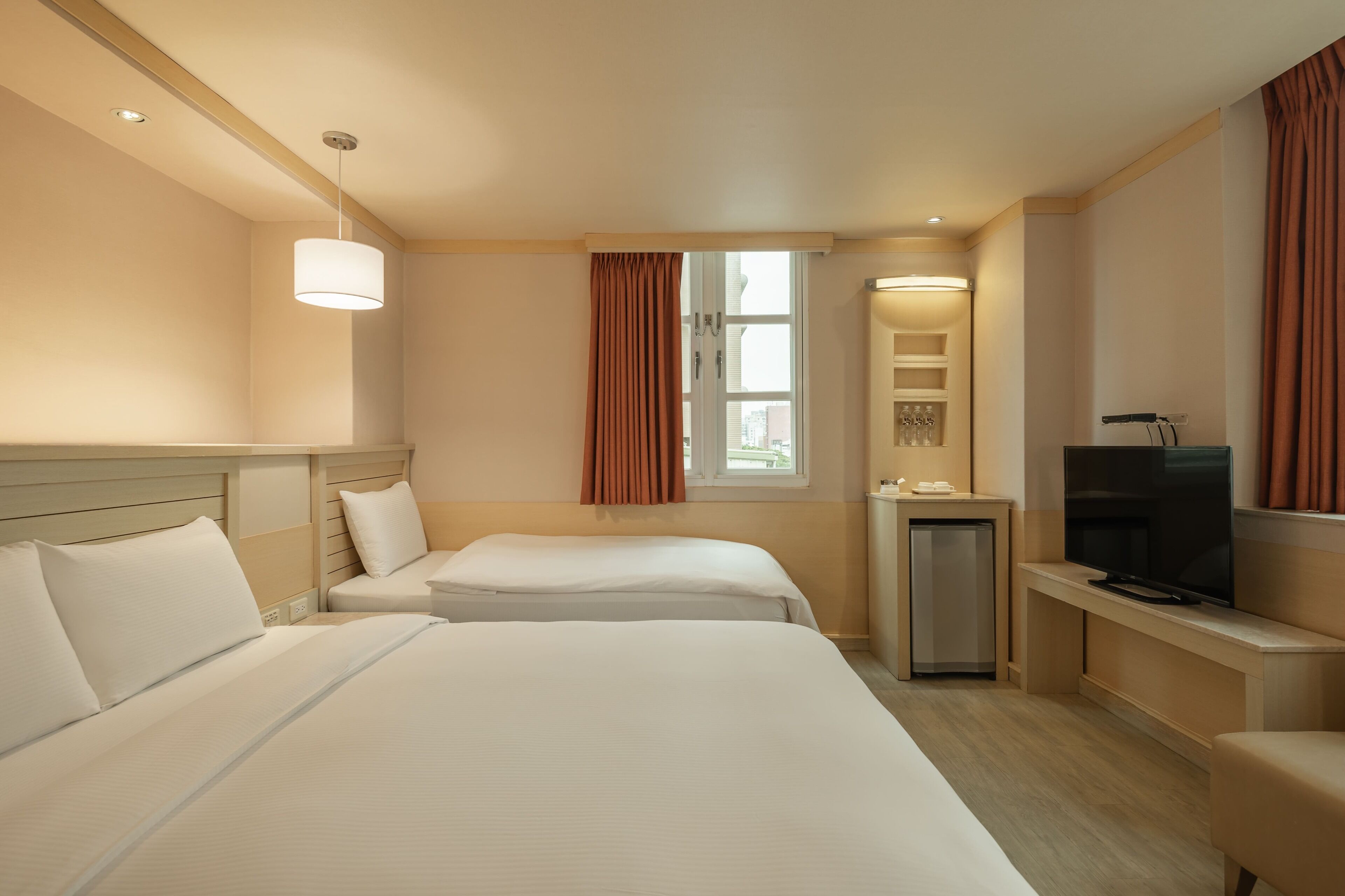 deluxe triple room | desk, soundproofing, free cots/infant beds, free wired internet