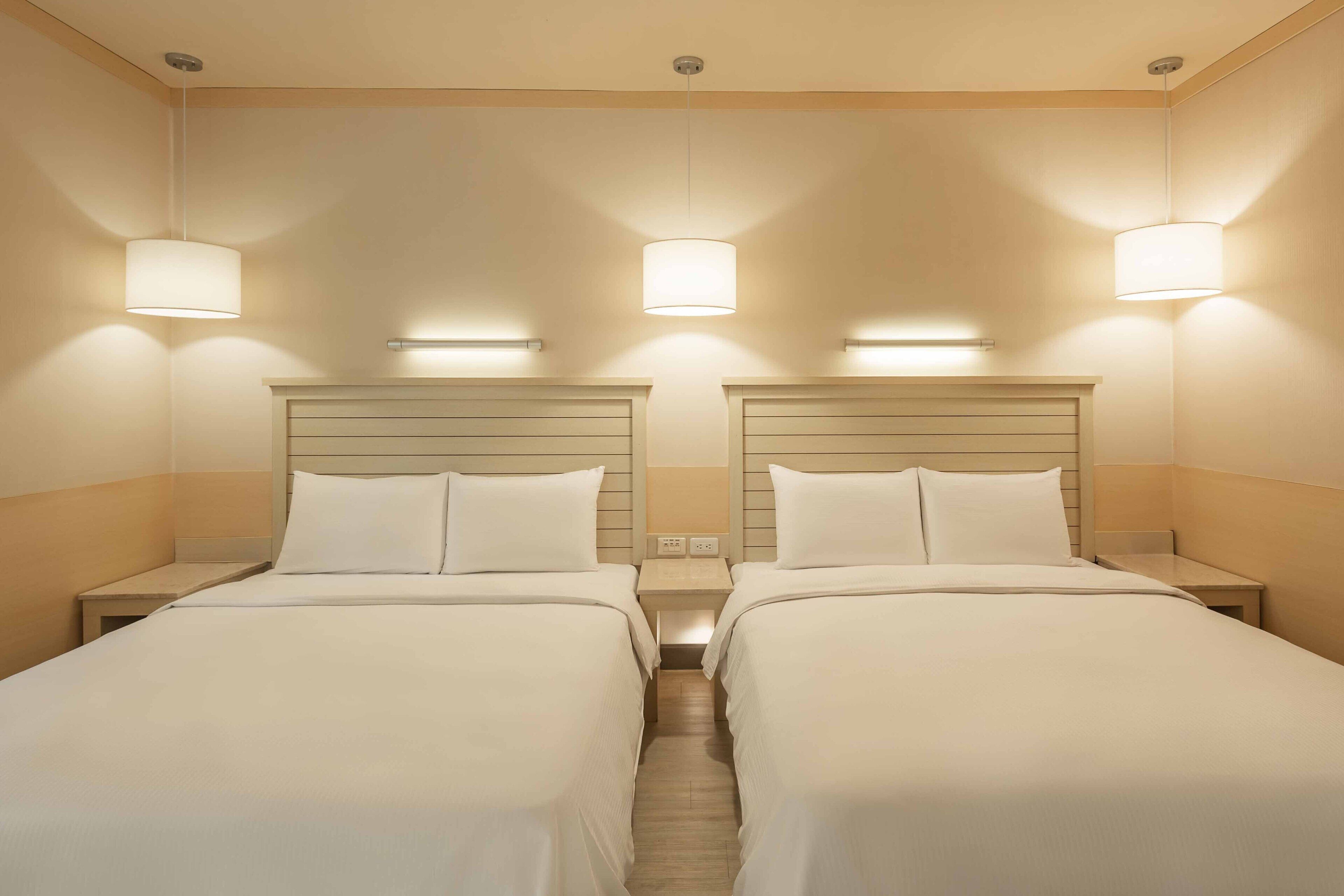 elite quadruple room | desk, soundproofing, free cots/infant beds, free wired internet