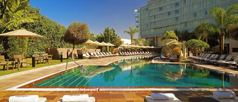 Outdoor pool, open 8:00 AM to 6:00 PM, cabanas (surcharge)