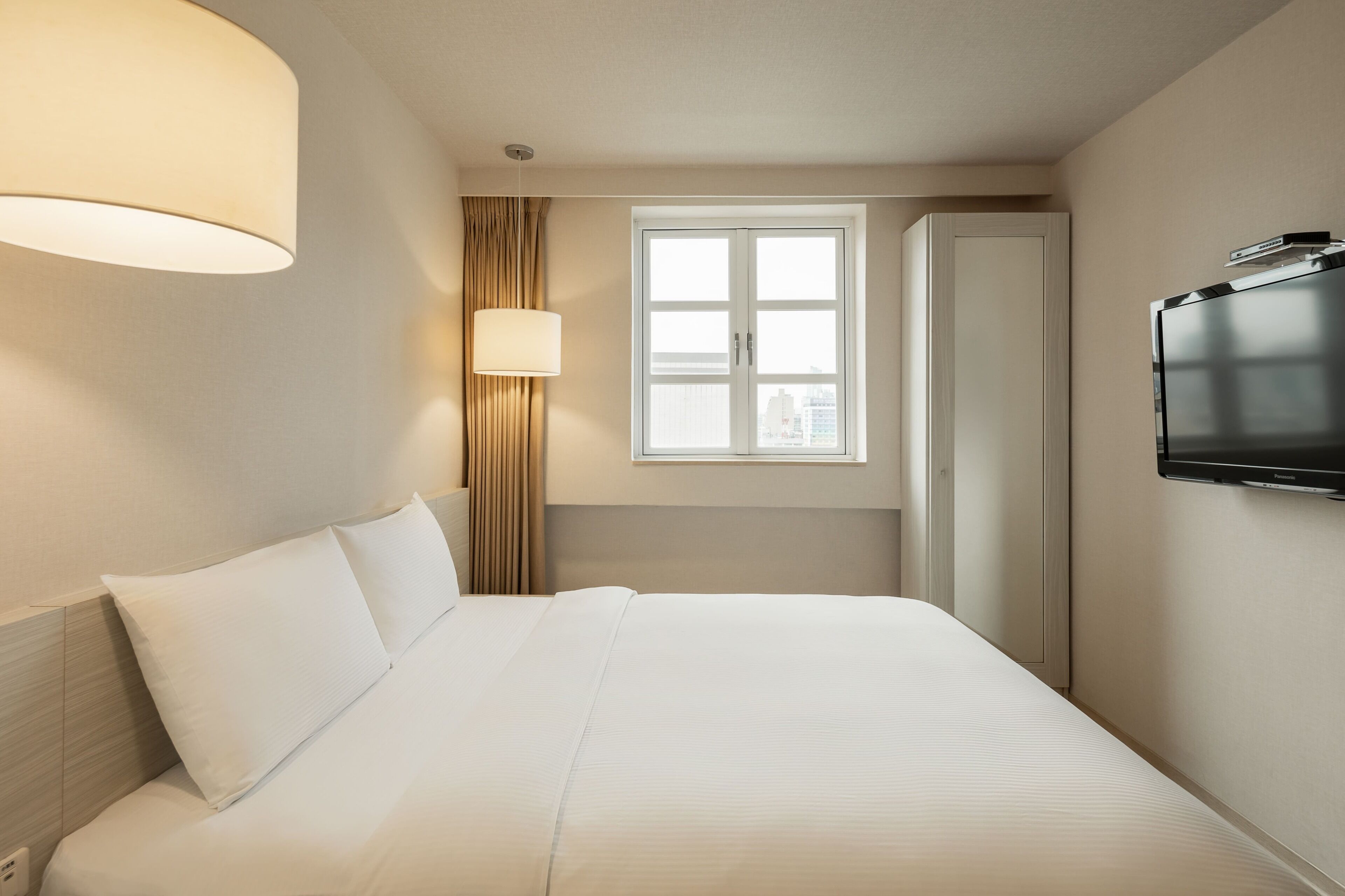 elite double room | desk, blackout curtains, soundproofing, free wifi