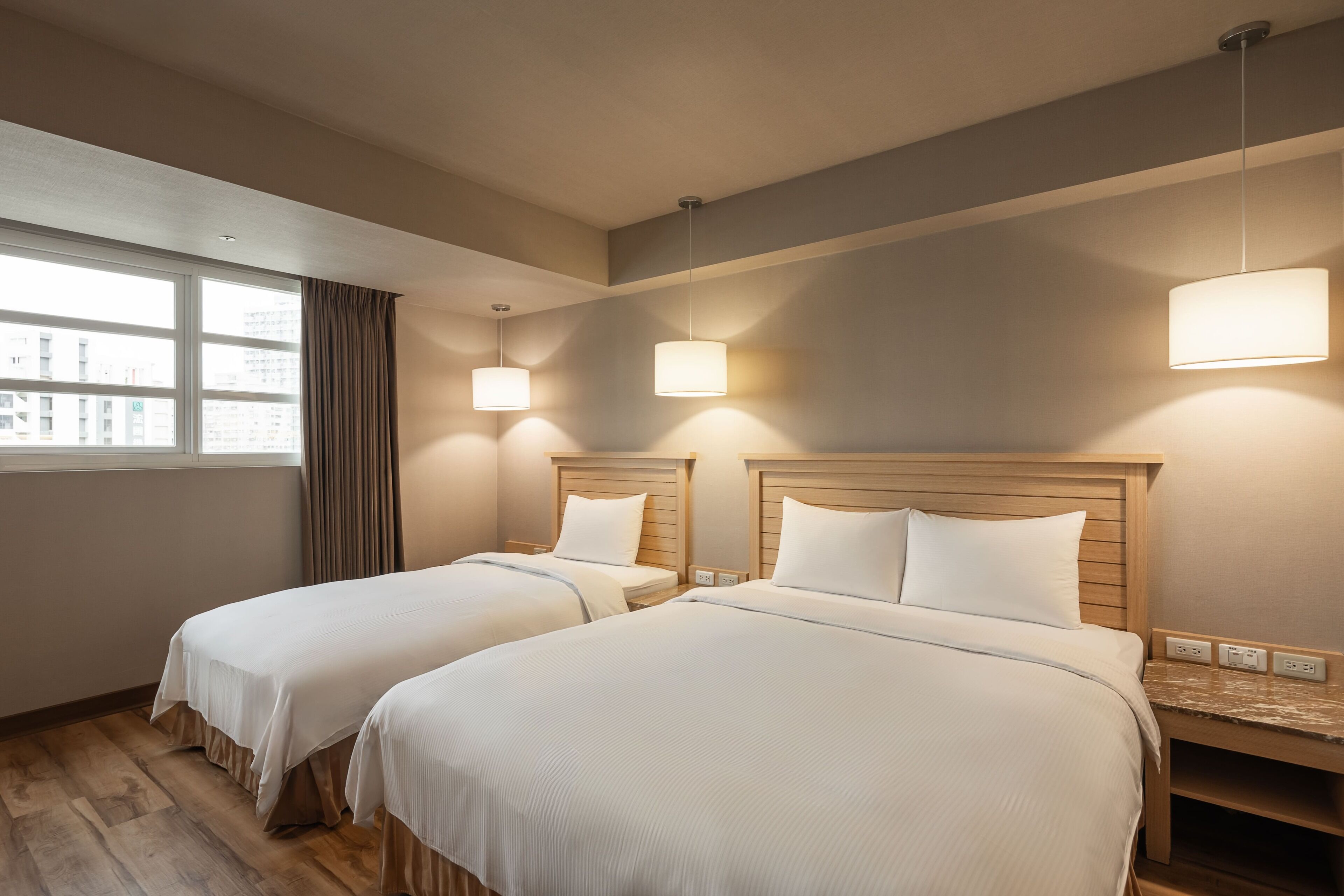 business triple room | down duvets, minibar, desk, blackout curtains