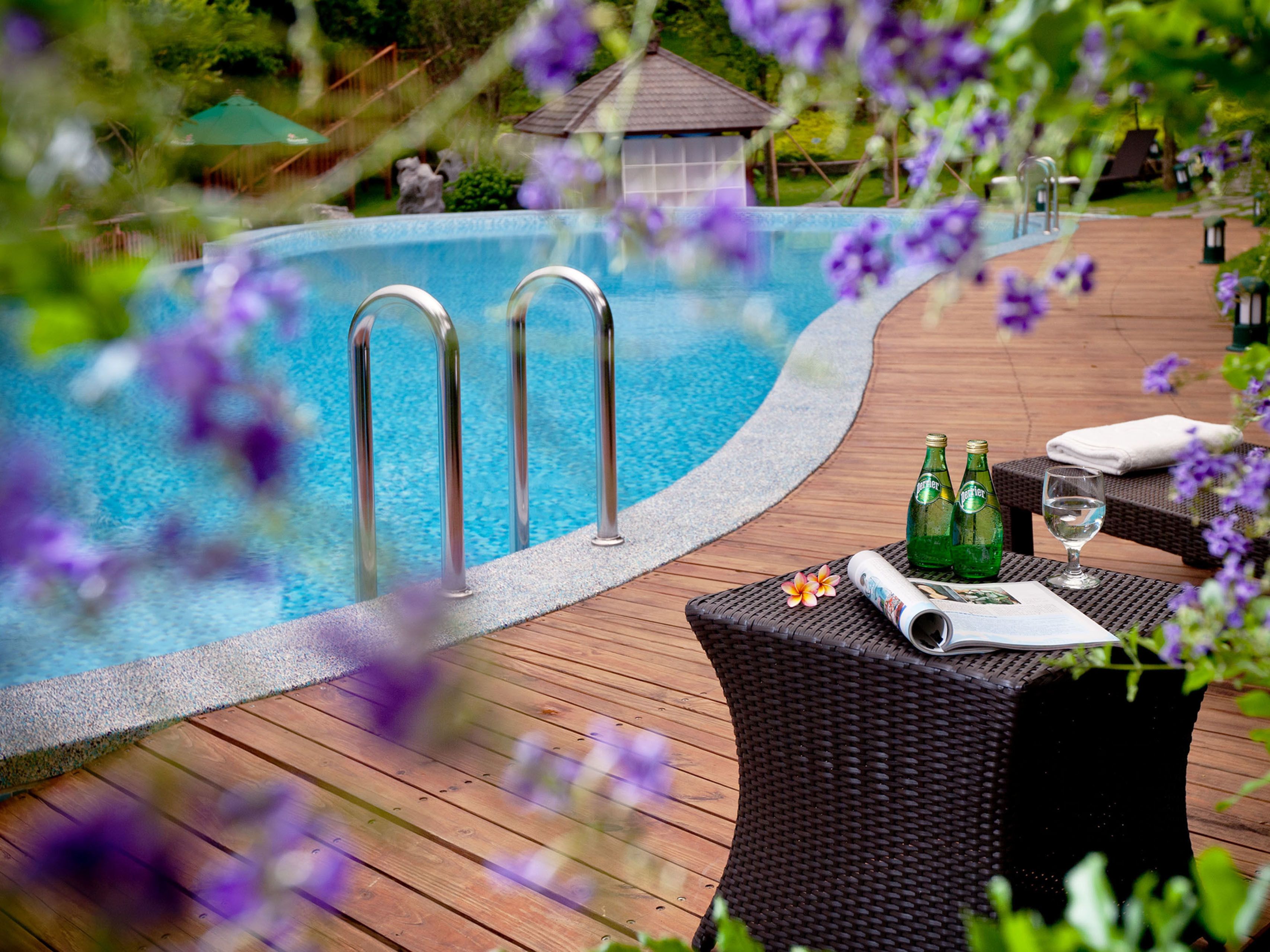 seasonal outdoor pool, pool umbrellas, pool loungers