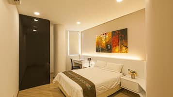 Three-Bedroom Suite | Individually furnished, desk, laptop workspace, blackout drapes