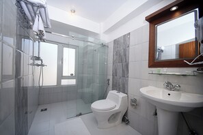 Shower, free toiletries, hair dryer, bathrobes