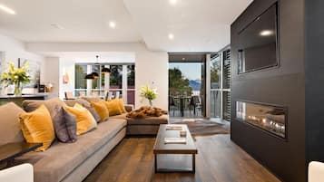 Appartement Deluxe (Earl St by Eichardt's) | Coin séjour | Télévision à écran plat, lecteur de DVD, station d'accueil iPod