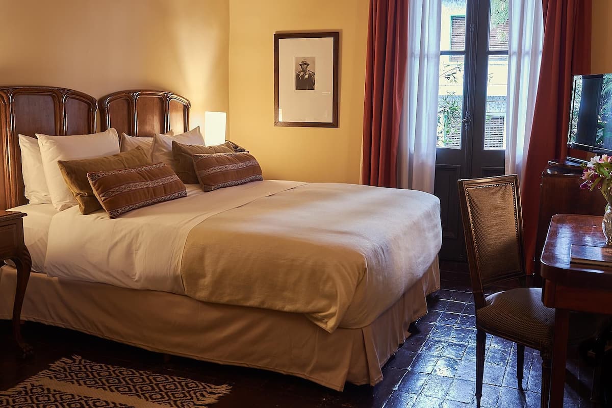 Premium bedding, pillow-top beds, minibar, in-room safe