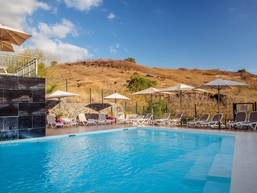 Outdoor pool, open 8:00 AM to 7:30 PM, pool umbrellas, pool loungers