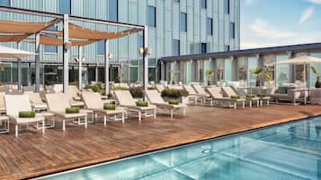 Seasonal outdoor pool, pool umbrellas, sun loungers