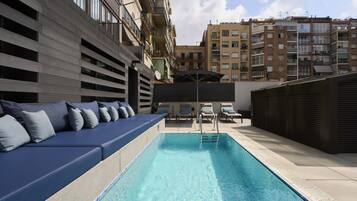 Outdoor pool, sun loungers