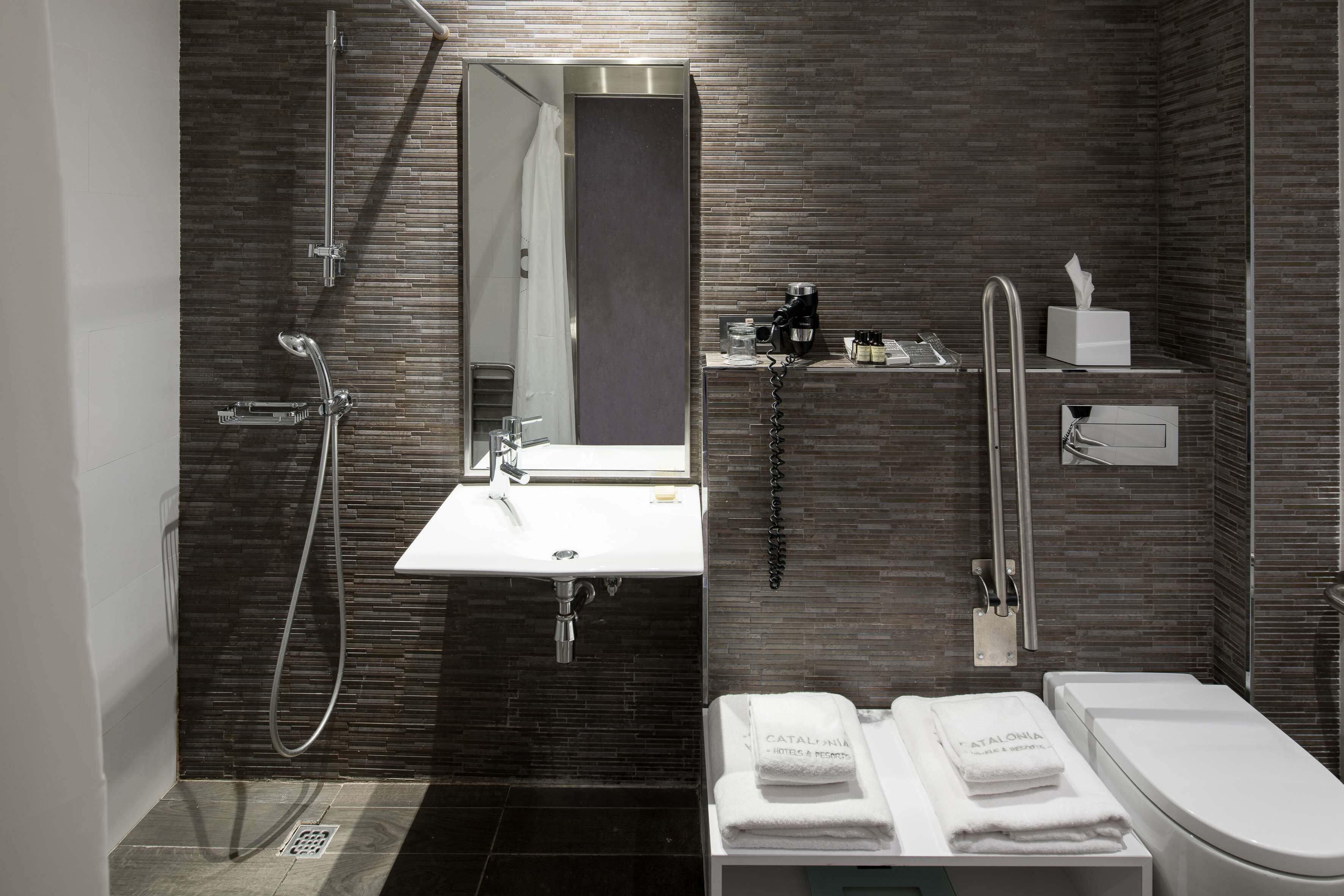 family room | bathroom | shower, eco-friendly toiletries, hair dryer, towels