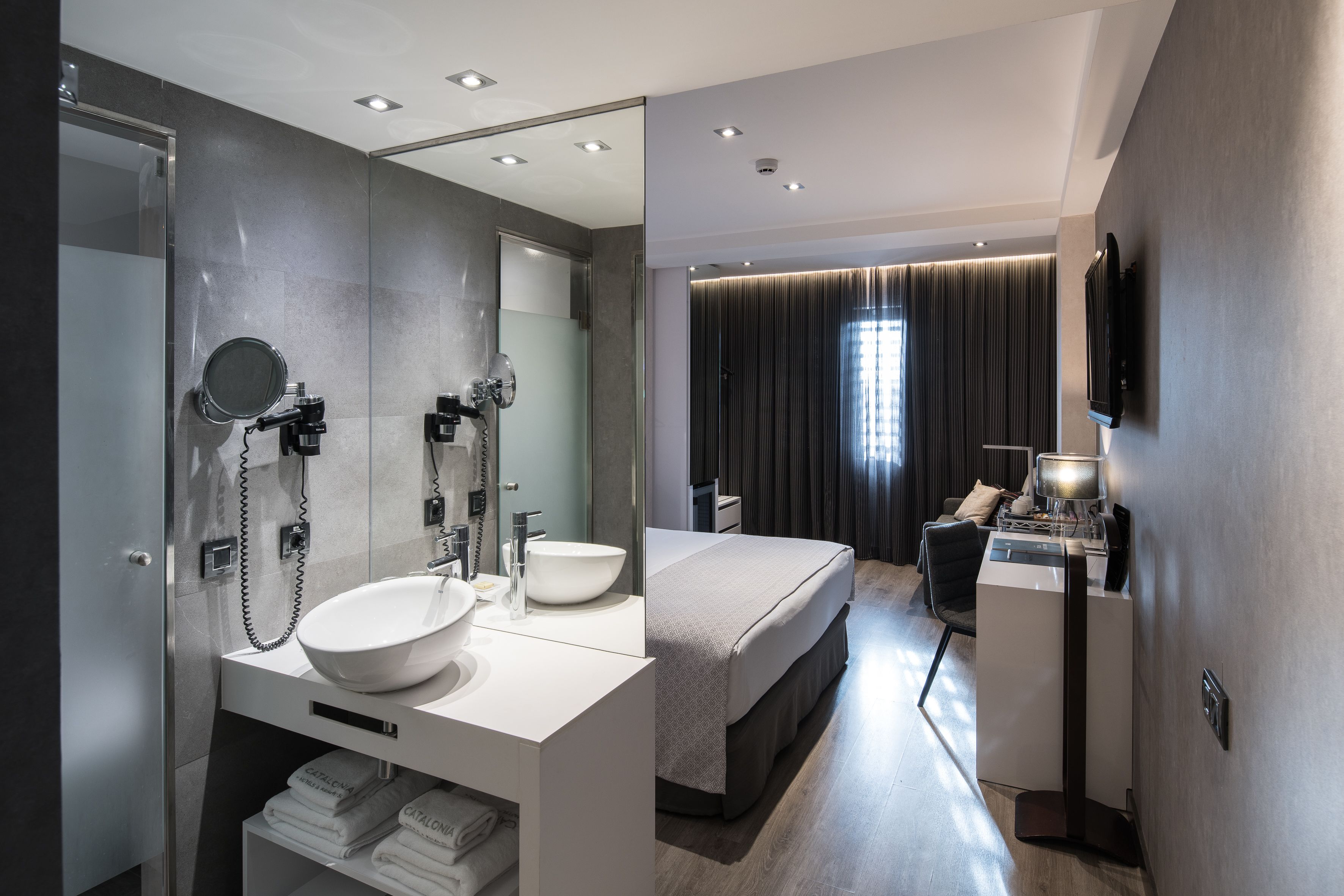 shower, eco-friendly toiletries, hair dryer, towels