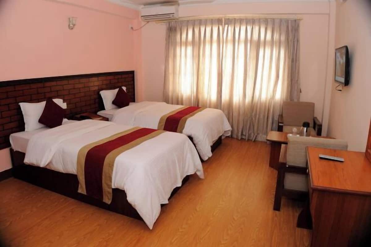 Premium bedding, memory foam beds, in-room safe, desk