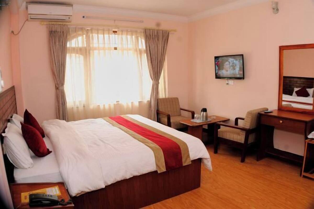 Premium bedding, memory foam beds, in-room safe, desk