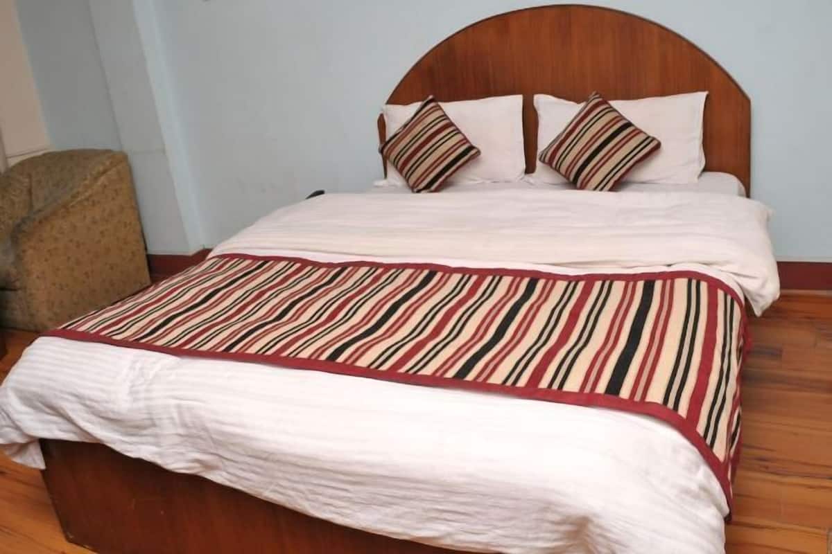 Premium bedding, memory-foam beds, in-room safe, individually decorated