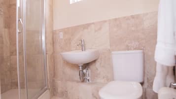 Three Bedroom Condo | Bathroom | Hair dryer, towels