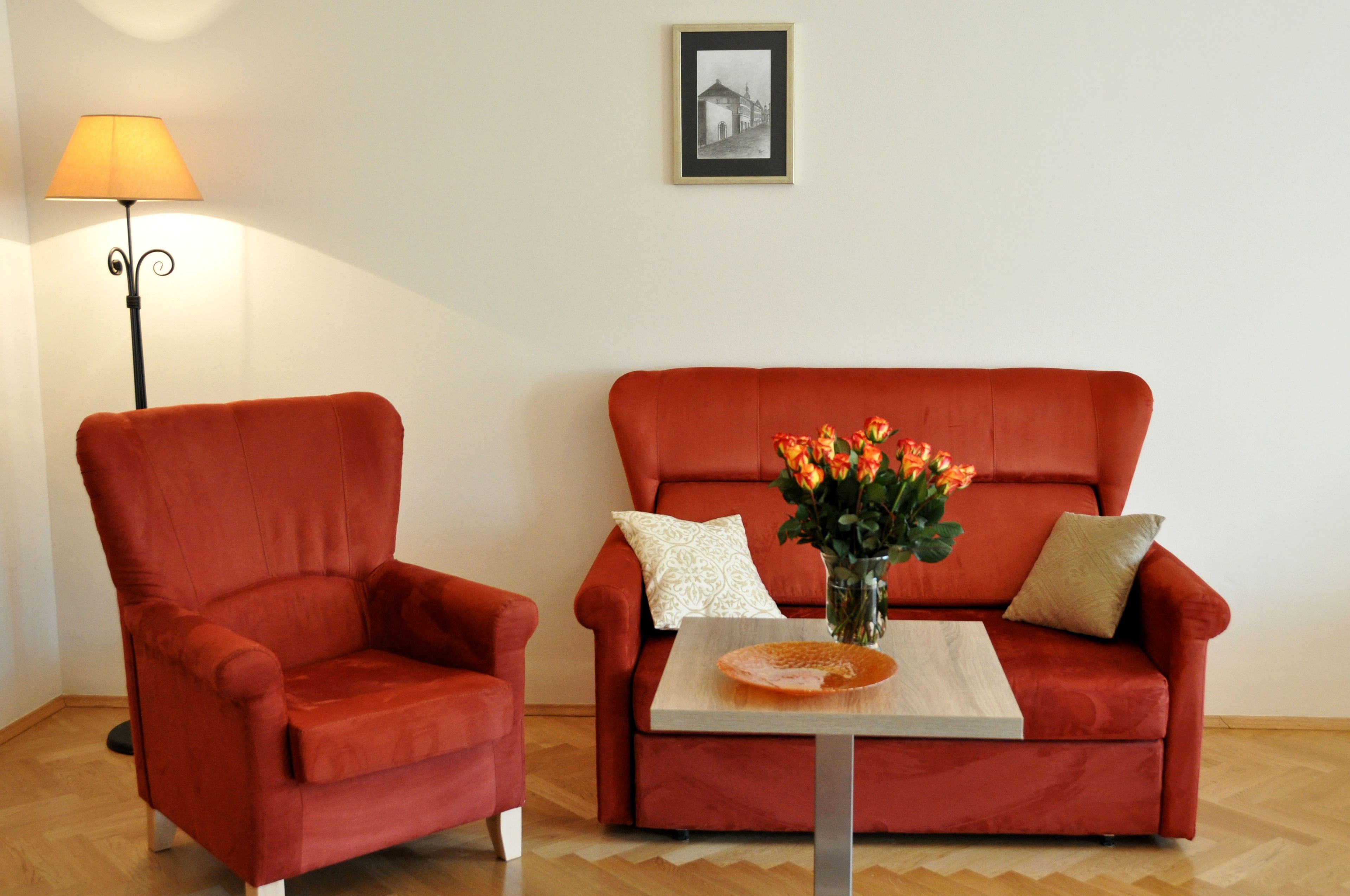 standard quadruple room | living area | lcd tv