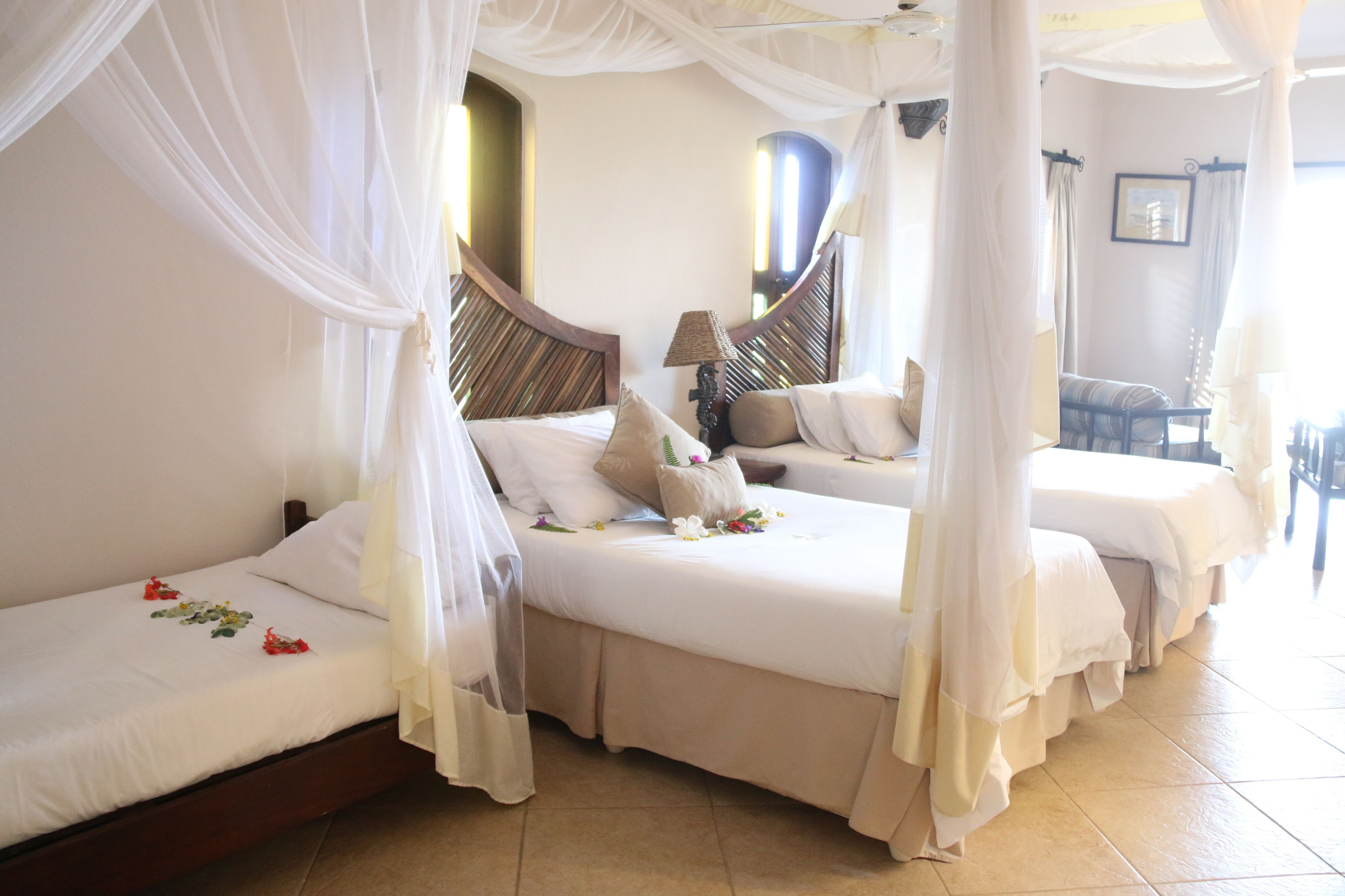 suite, 3 single beds (courtyard triple, airport transfers) | in-room safe, rollaway beds, free wifi