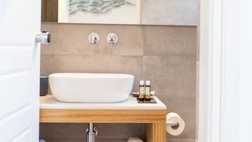 Shower, free toiletries, hair dryer, slippers