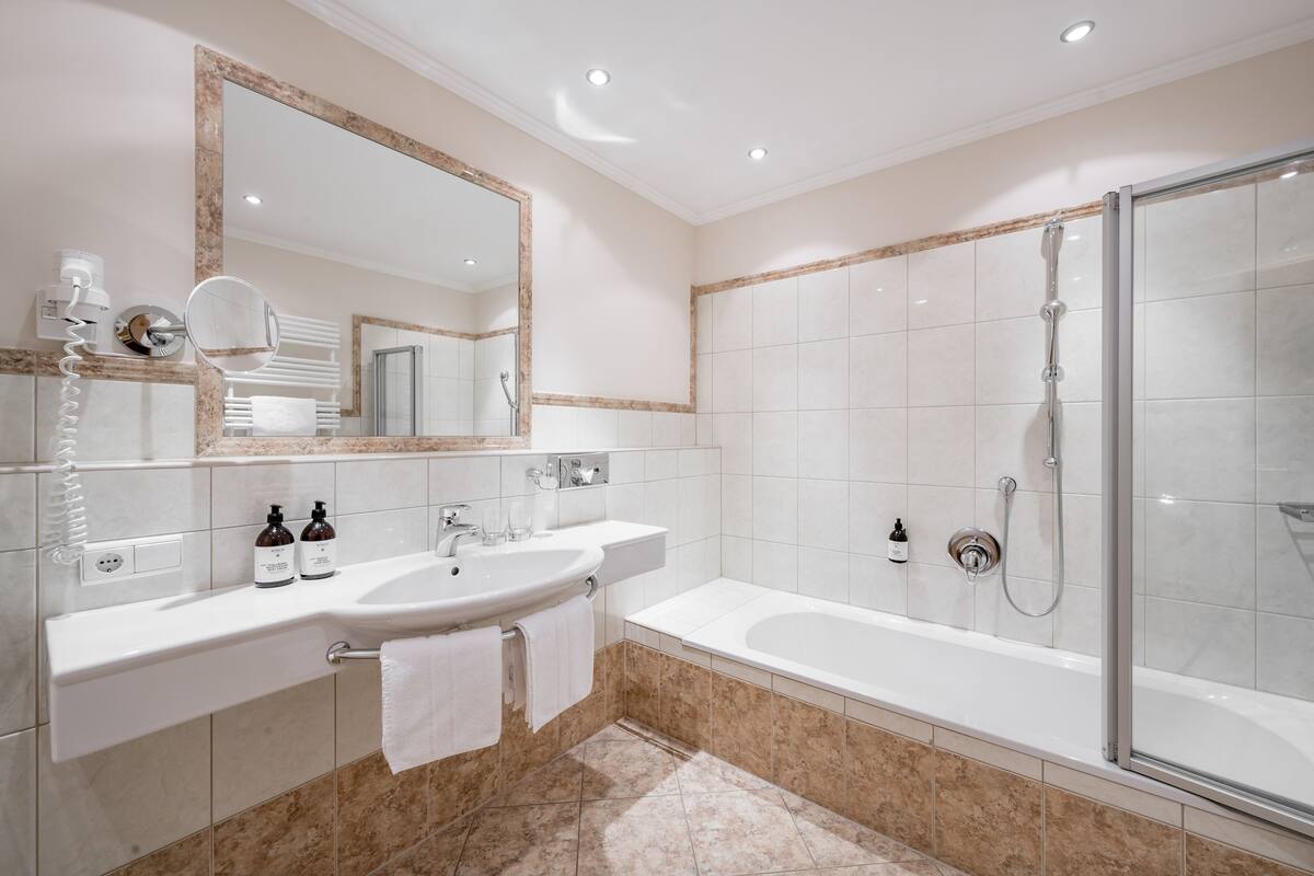 comfort double room, mountain view | bathroom | eco-friendly toiletries, hair dryer, bathrobes, slippers