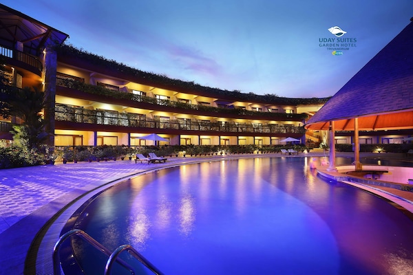 Outdoor pool, open 7:00 AM to 6:00 PM, pool umbrellas, pool loungers