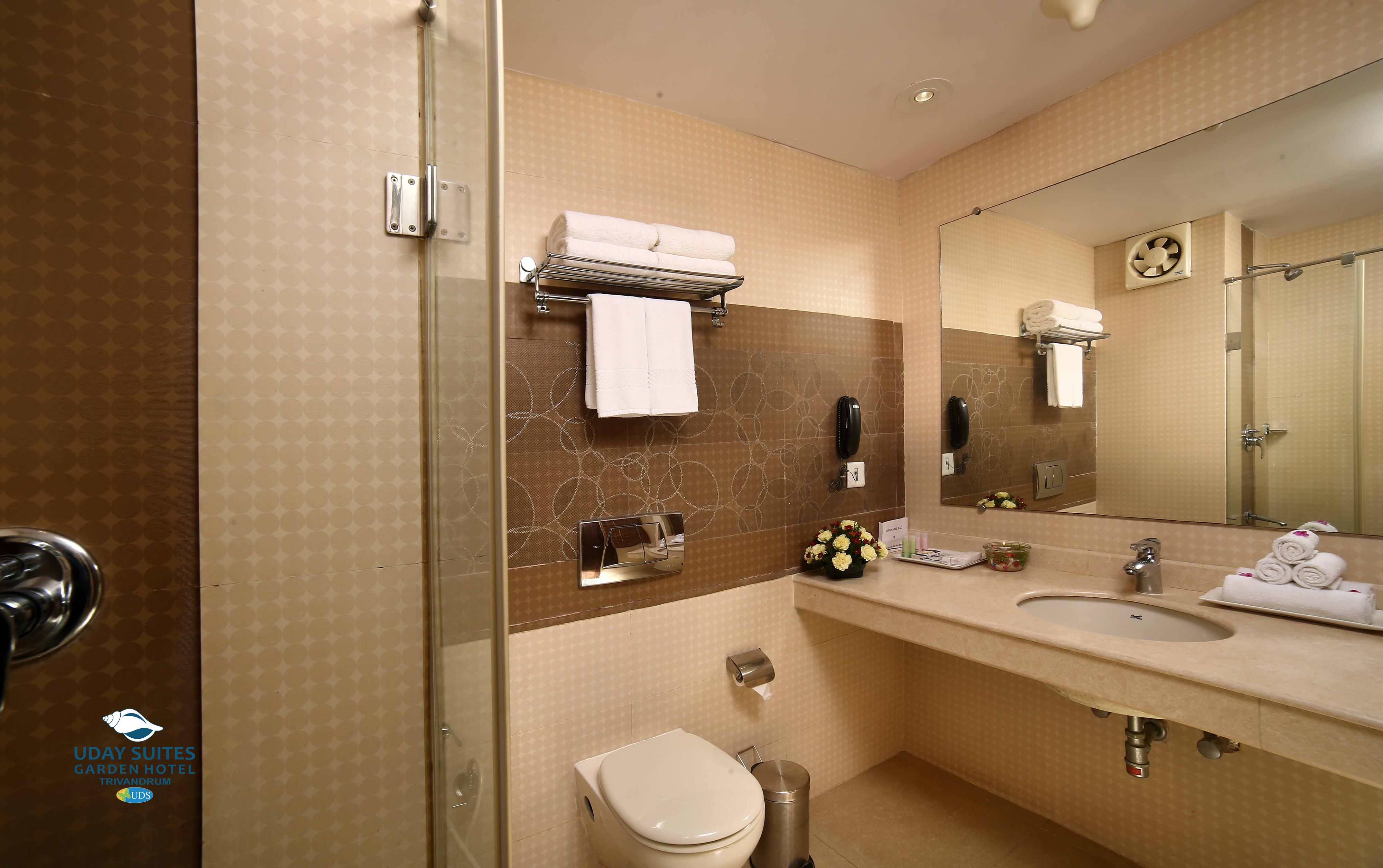 rainfall showerhead, hair dryer, bathrobes, slippers