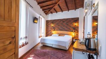 Minibar, safe på rommet og barnesenger (inkludert)