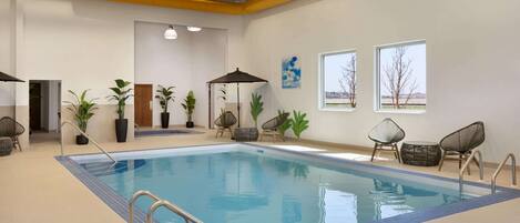 Indoor pool, open 9:00 AM to 10:00 PM, sun loungers